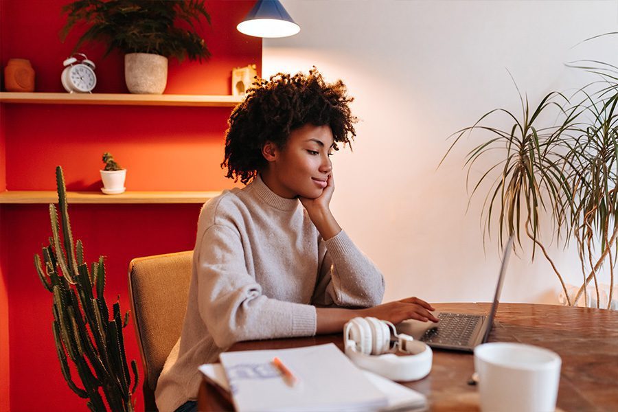 smiling dark skinned girl in white sweater works i 2021 05 25 23 39 49 utc.jpg